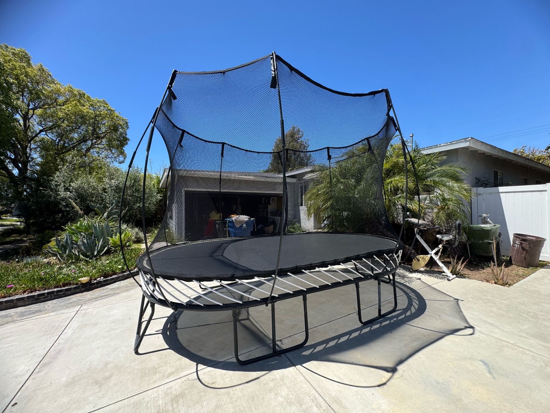 Springfree® Trampoline with basketball hoop and ladder