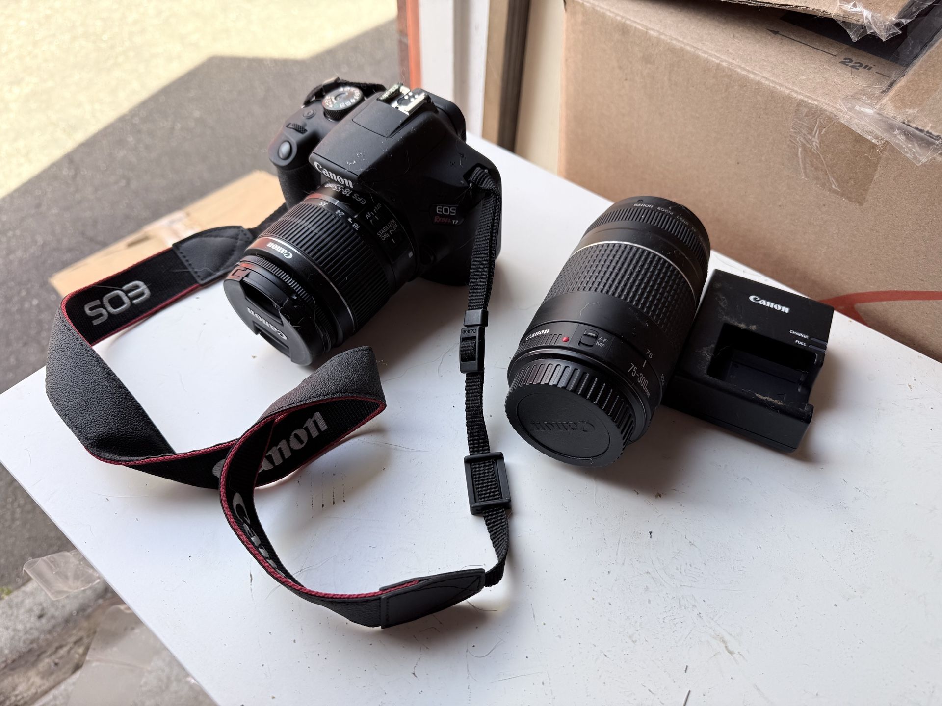 Canon EOS Rebel T7 DSLR Camera with 18-55mm Lens Bundled with 32GB Memory Card + 75-300mm lens