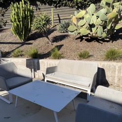 Backyard Couch, Chairs, and Table