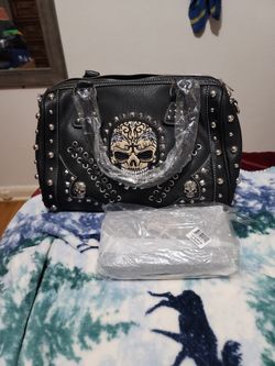 Black rockin Skull arm bag with strap and matching wallet case