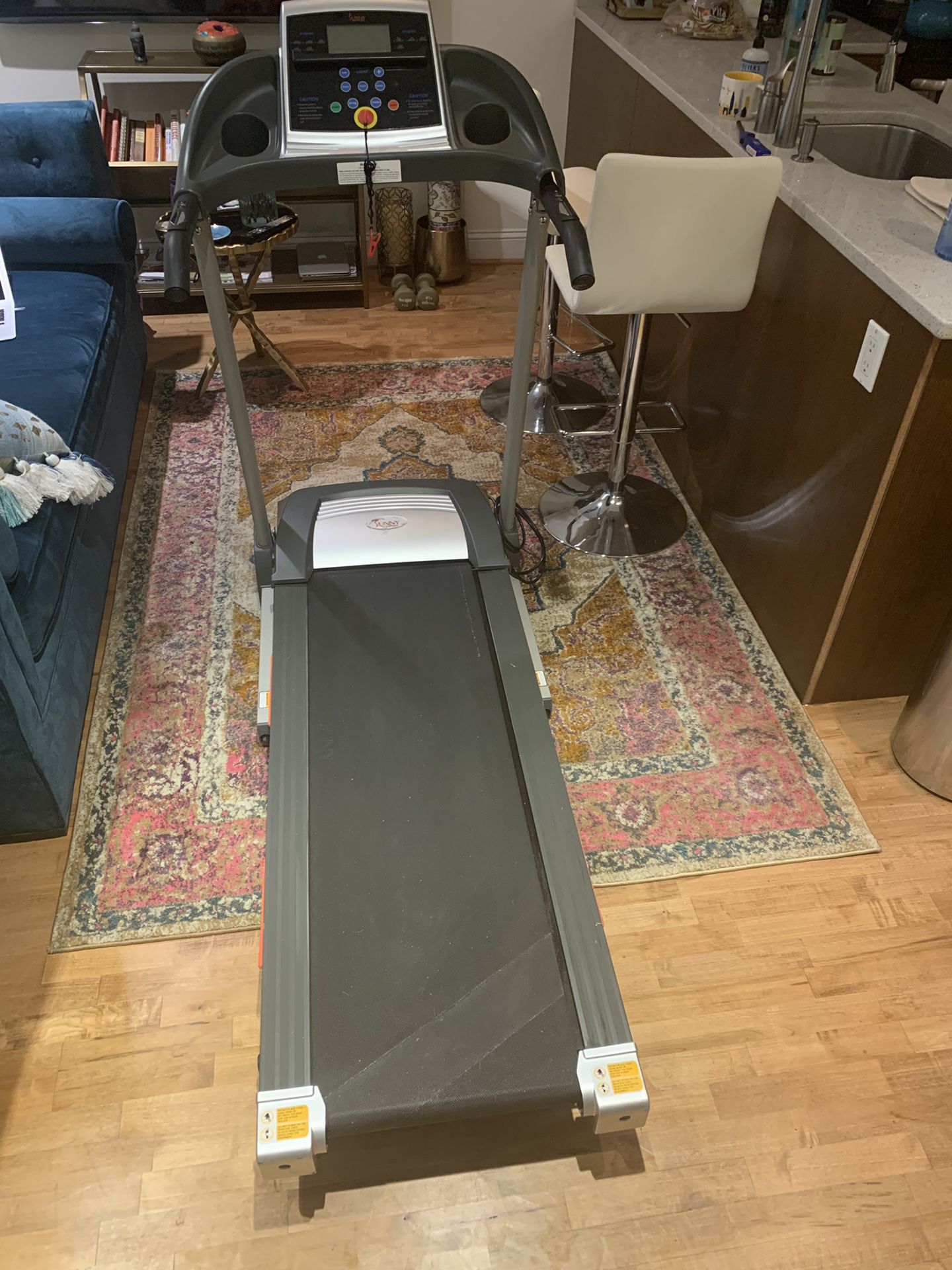New barely used Sunny Health and Fitness folding treadmill