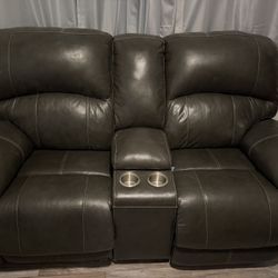 Ashley  Dual Power Gray Leather Reclining Love Seat.