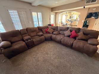 Brown sectional with 4 recliners