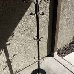 Floor standing clothes rack with stone base