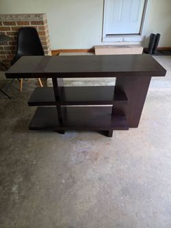 TV/Media Stand . 48" Long 16" Wide 29" Tall . $30