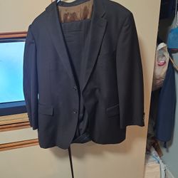 Boss suit with pants used two pieces suit not determine size.I think is a medium jacket  or it could be a small look at pictures for description on si