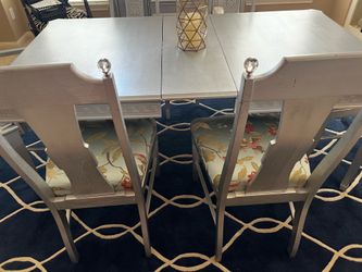 Table with 6 chairs and buffet