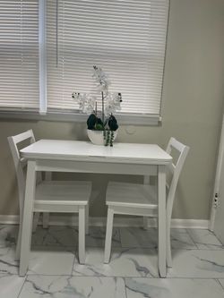 Aremy rectangular 3 piece extendable dinning set