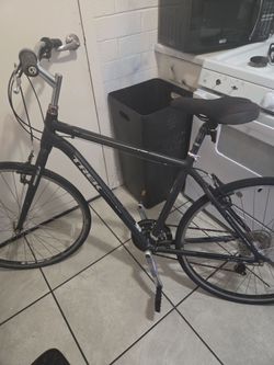 WILL TRADE FOR CAR SUBS.  Trek Verve 1 hybrid comfort bicycle.Frame: Lightweight aluminum with an upright geometry.Handlebars: High-rise sweep handleb