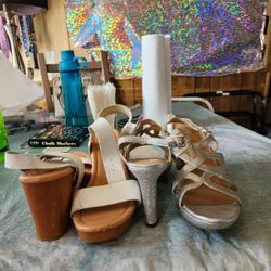 USED  2 PAIRS OF SUMMER HEELS.  SIZE 81/ 2  BOTH PAIRS. USED. 