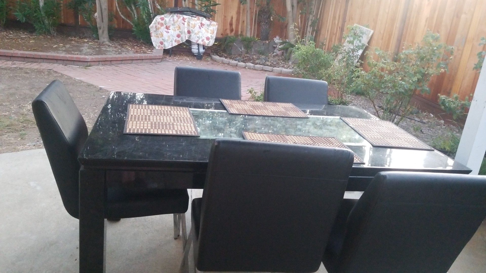 Mirror black dining table with six chairs