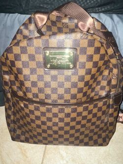 Louis Vuitton Discovery Bookbag