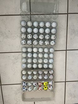 Two Dozen Titleist , Callaway And Taylormade Golf Balls