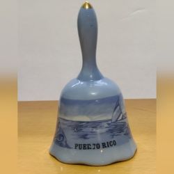 Vintage Porcelain Bell 
has sticker residue on it 
some of the lettering is worn off 