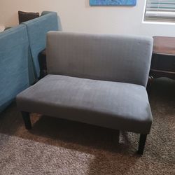 Clean gray armless love seat asking $60 cash must pick up Broadway and apache buckeye az cost double in stores great for small spaces,kids room,bedroo