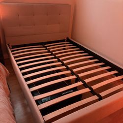 beige bed frame with headboard