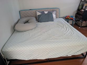 King size bed with waterproof protector and frame