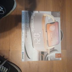 Six And One Portable Stereo Speaker And Wireless Charging And Ambient Light