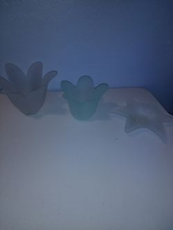 3 Flower shaped candle holders