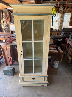 Vintage glass curio cabinet