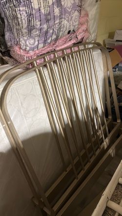 Set of Twin beds with frames, headboards, and sheets