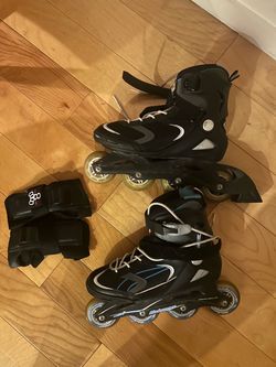 Women’s rollerblades plus carry bag and wrist guards