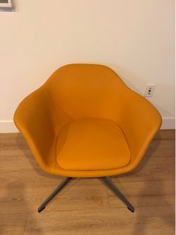2 Orange leather chairs