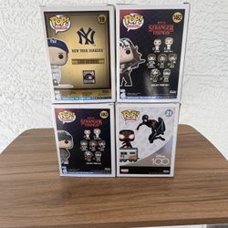 Funko Pops Eddie, Dustin, Lou Gehrig , Miles Morales On Subway Car 