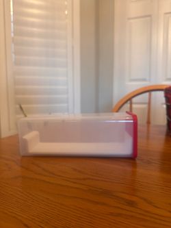 $10 - Gently used or New Tupperware block cheese or Velveeta keeper. Clear rectangular container with a slide-out white tray and a red lid.  Pickup on