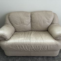 Tan Love Seat