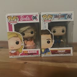 2 Slightly Worn Bobble Heads