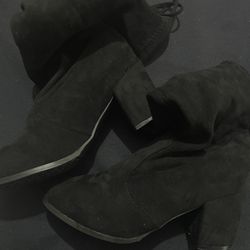 Black high thigh boots