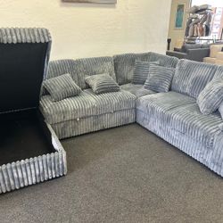 Sectional In Gray With Storage Chaise 