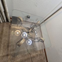 Set of 2 - Square glass corner table- heavy metal base.