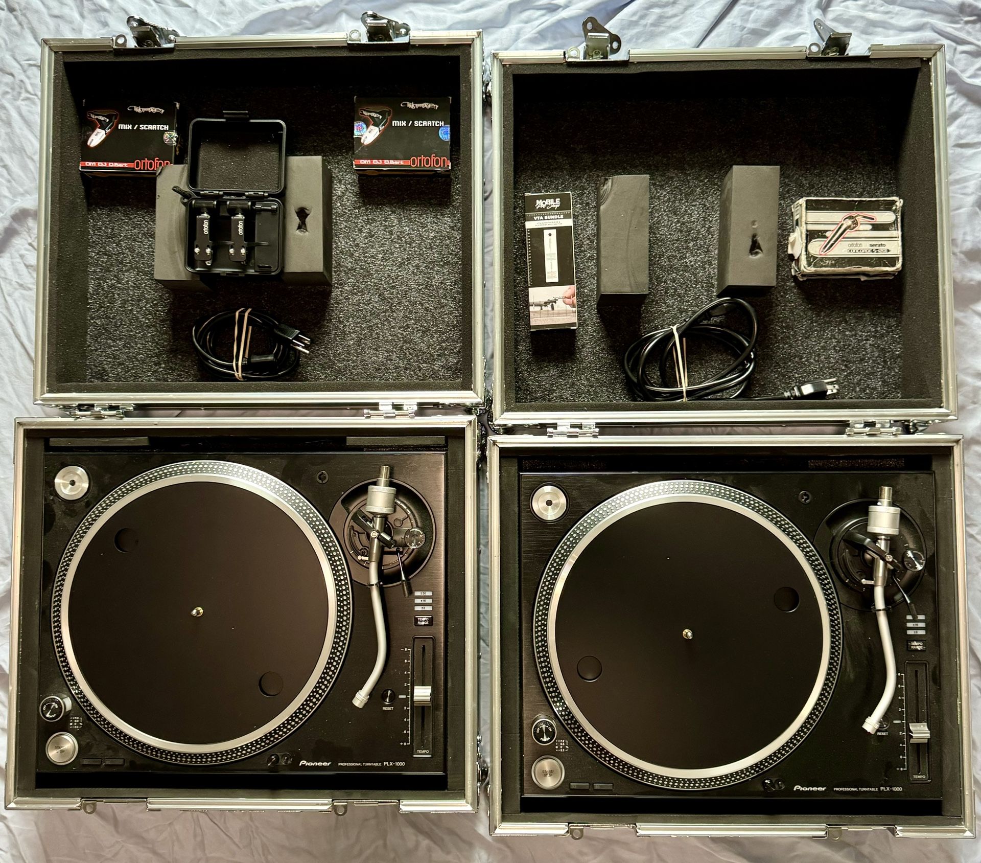 Pair of Pioneer PLX-1000 turntables & DJ Qbert Ortofon needles with flight cases