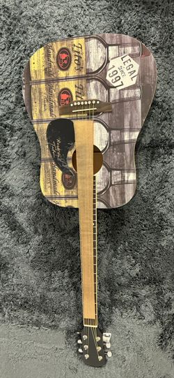 Tito’s Handmade Vodka Guitar. Signed