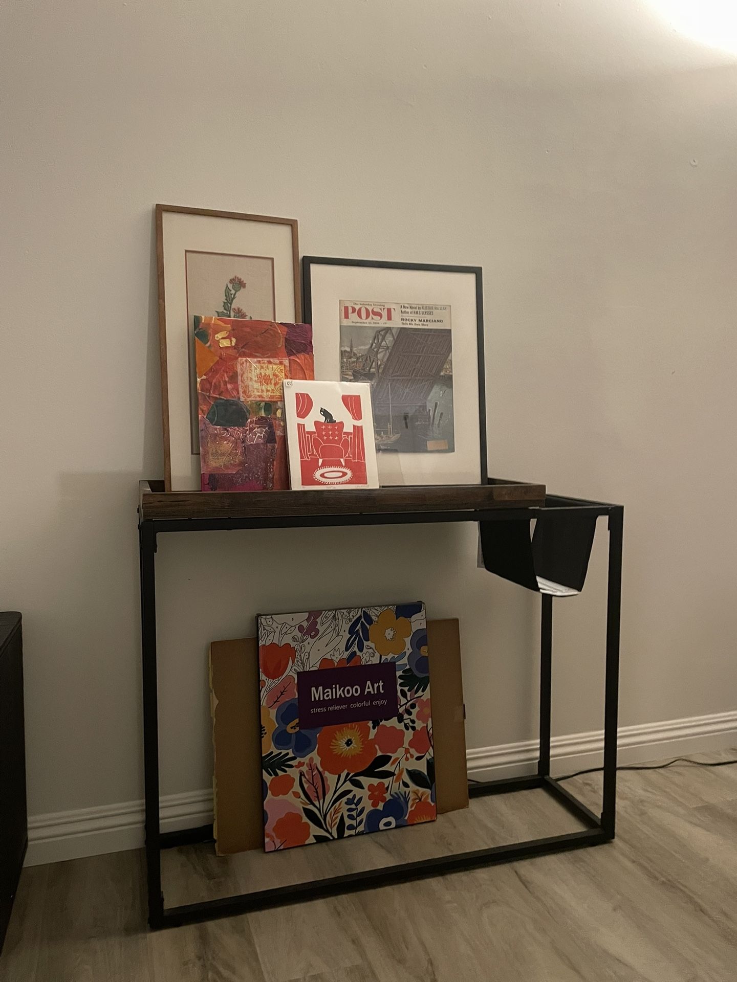 Entry console table with magazine rack hammock