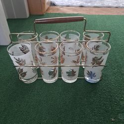 Set of vintage drinking glasses with carrier