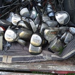 Assortment Of Golf Clubs and Golf Balls For Sale