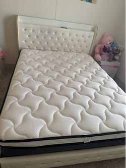 Bed with mattress