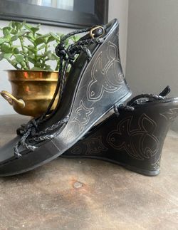 Antonio Milani tattoo wedges