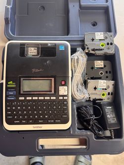 Brother P-Touch PT-2730 with carry case and label tapes