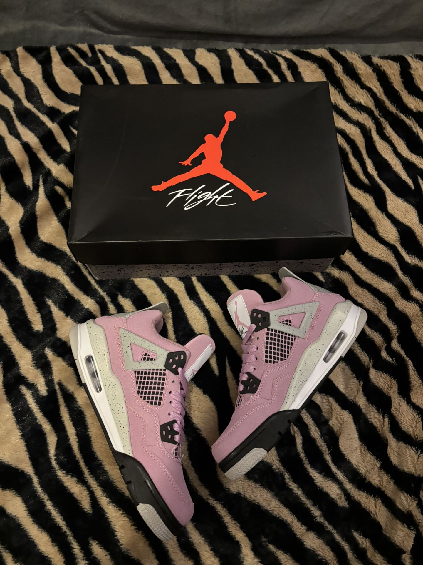 Pink Orchid Jordan 4 Size 7W Women’s Sneakers