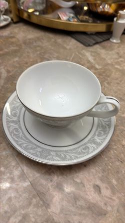 White Porcelain Teacup and Saucer Set