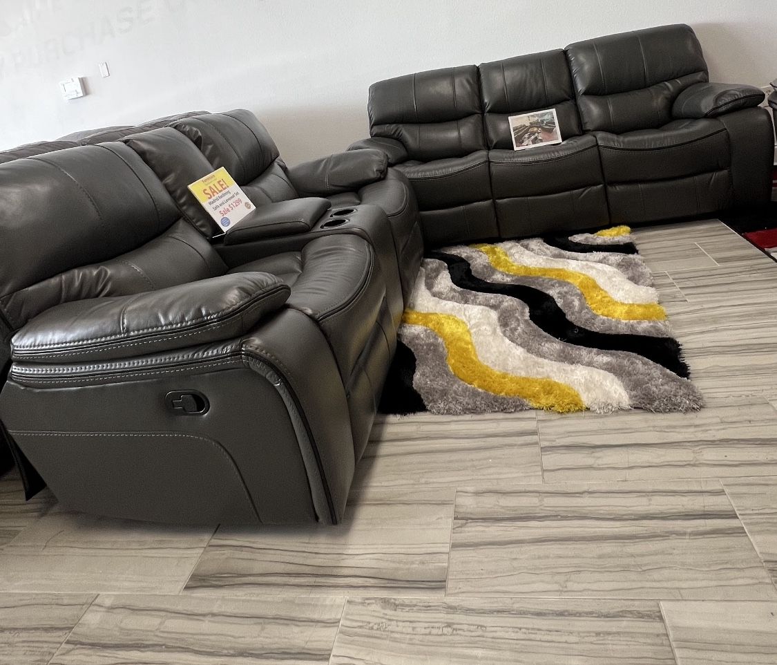 Going out of business sale. Madrid, gray leather reclining sofa and loveseat set now $1099. Easy finance option. Same day delivery.