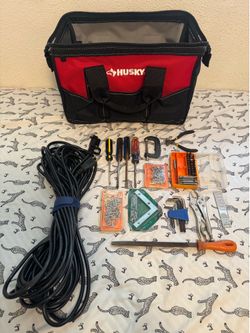 15 in tool bag, extension cord and tools