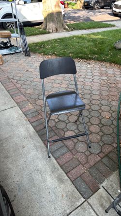 3–Black and silver ikea chairs