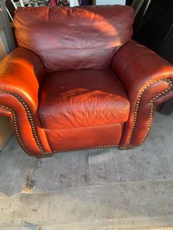 Leather comfy brown with silver studs arm chair