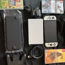 Nintendo Switch OLED Model With Games And More