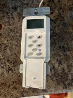 Programmable Timer designed for in-wall mounting to automate lighting